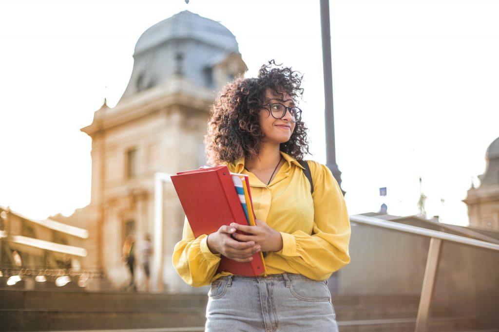 A college student informed about student loan changes.